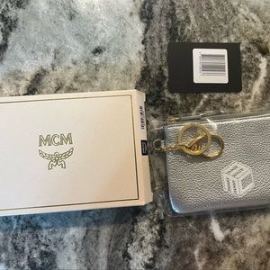 MCM Mini Zippy wallet/pouch with card slot and key ring.      NWT in box